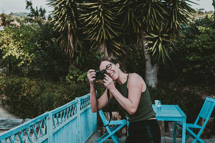 female photographer with camera