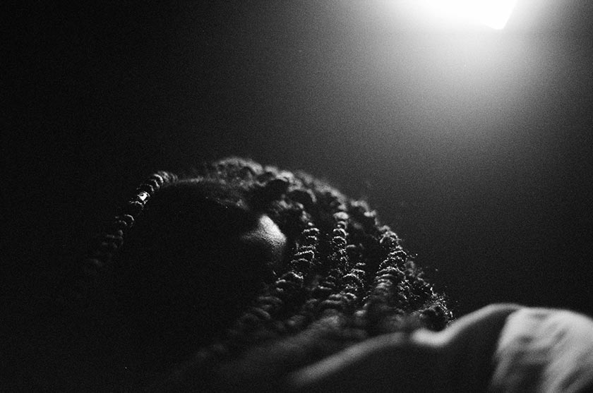 black and white portrait with narrow depth of field, with the focus on the hair texture