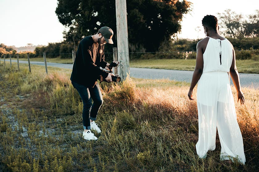 photographer capturing video between stills