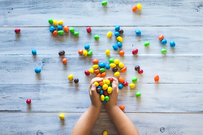 hands with candy