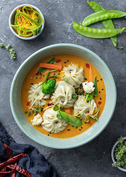 bowl of noodles on concrete