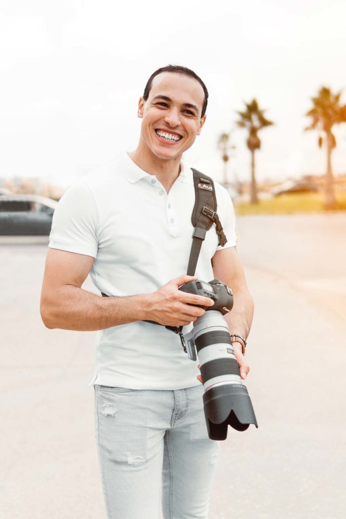 photographer with telephoto lens