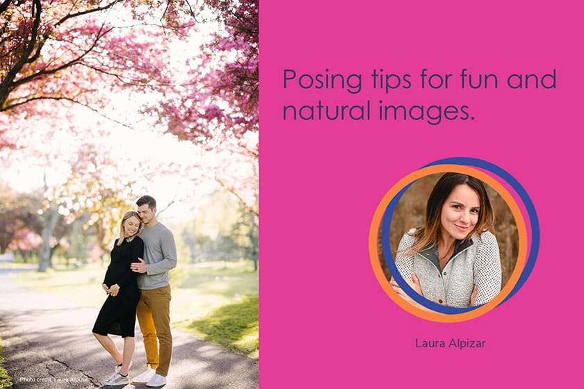 couple posing beneath flowering trees