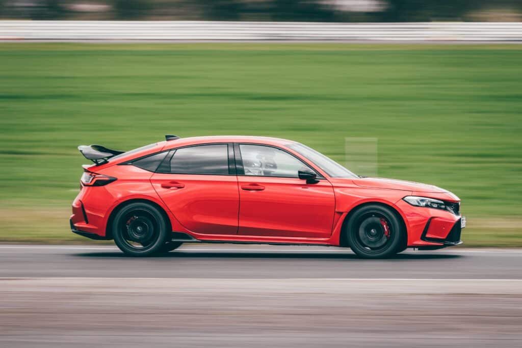 red car on race track