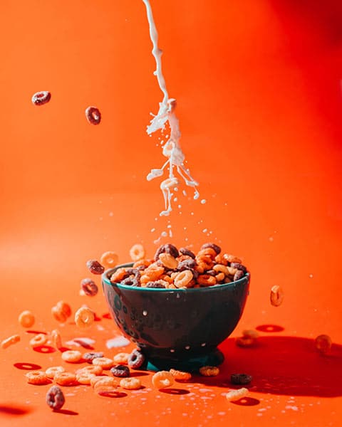 bowl of cereal with splash of milk