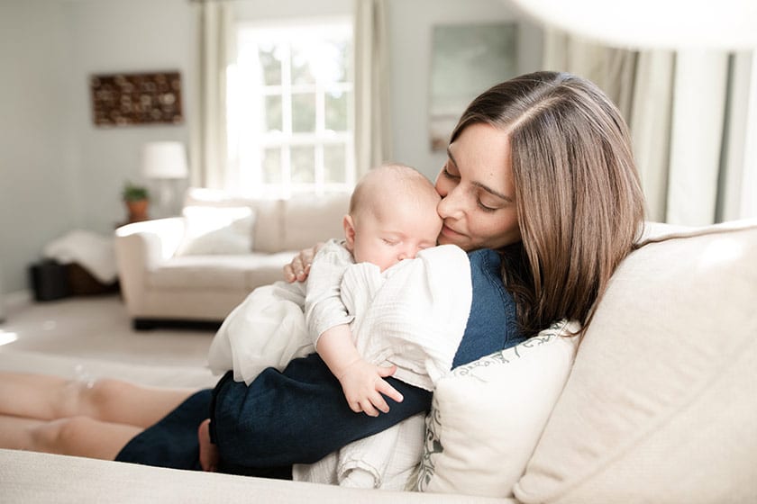 mother soothing sleepy baby