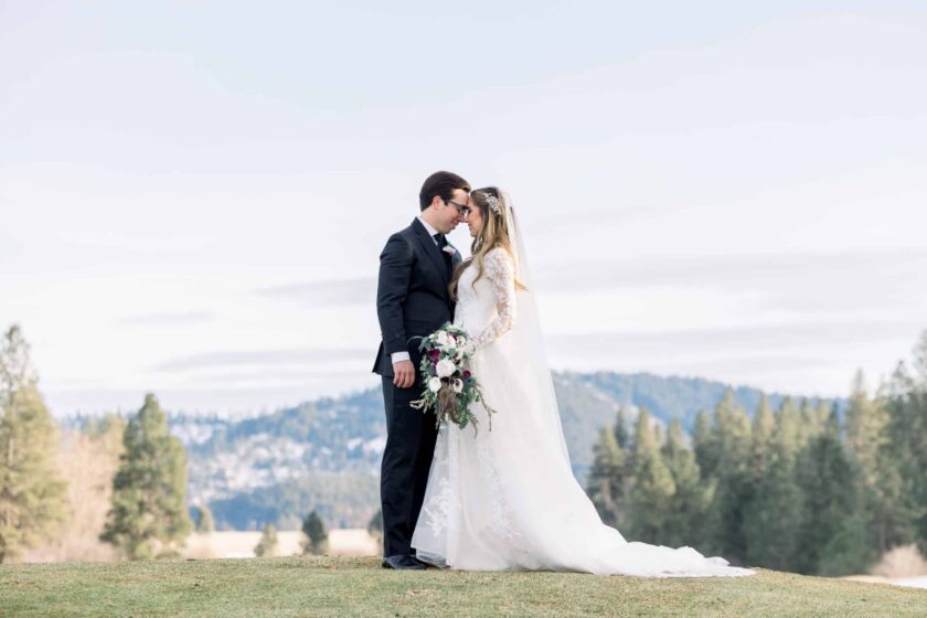 wedding couple portrait at mountains by Stephanie Schnautz