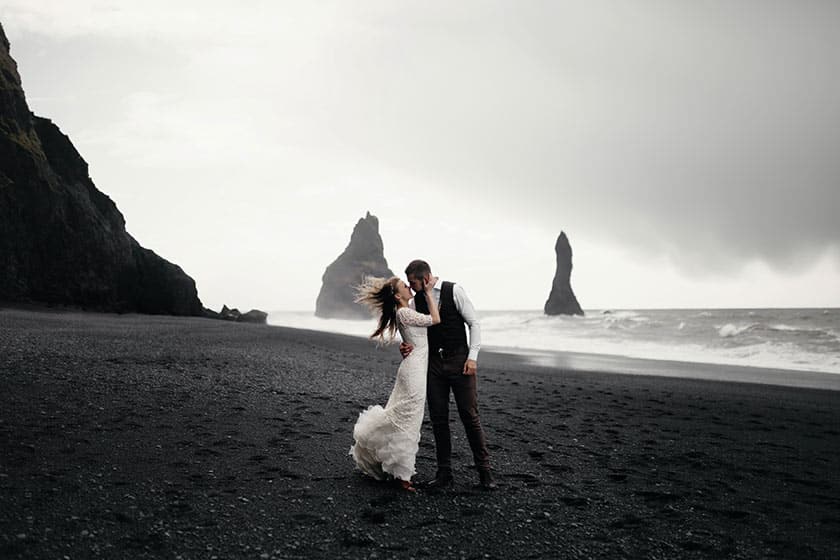 Bride and groom on beach