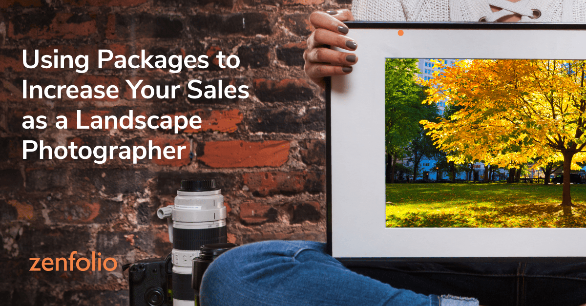 a photo of a person holding up their landscape frame